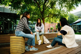 Female student happy blue wall