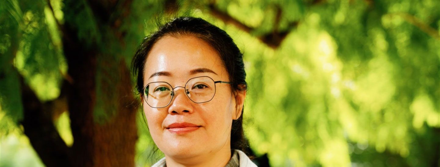 Female student outside happy