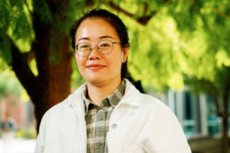 Female student outside happy