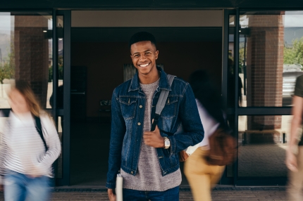 Male student walking campus