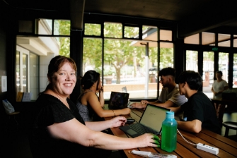 Student inside campus working studying