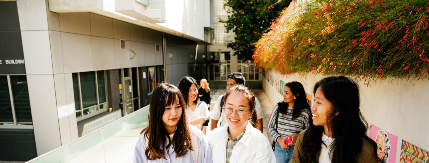 Students together on campus happy